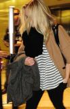 th_43765_Preppie_-_Kristen_Bell_departs_LAX_Airport_-_Jan._17_2010_460_122_1078lo.jpg