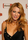Blake Lively shows cleavage and legs in small black dress at Vitaminwater Celebrates in Style with The Best of Baseball and Music in NY